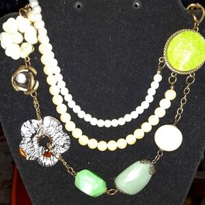 Multi-strand multi-media necklace